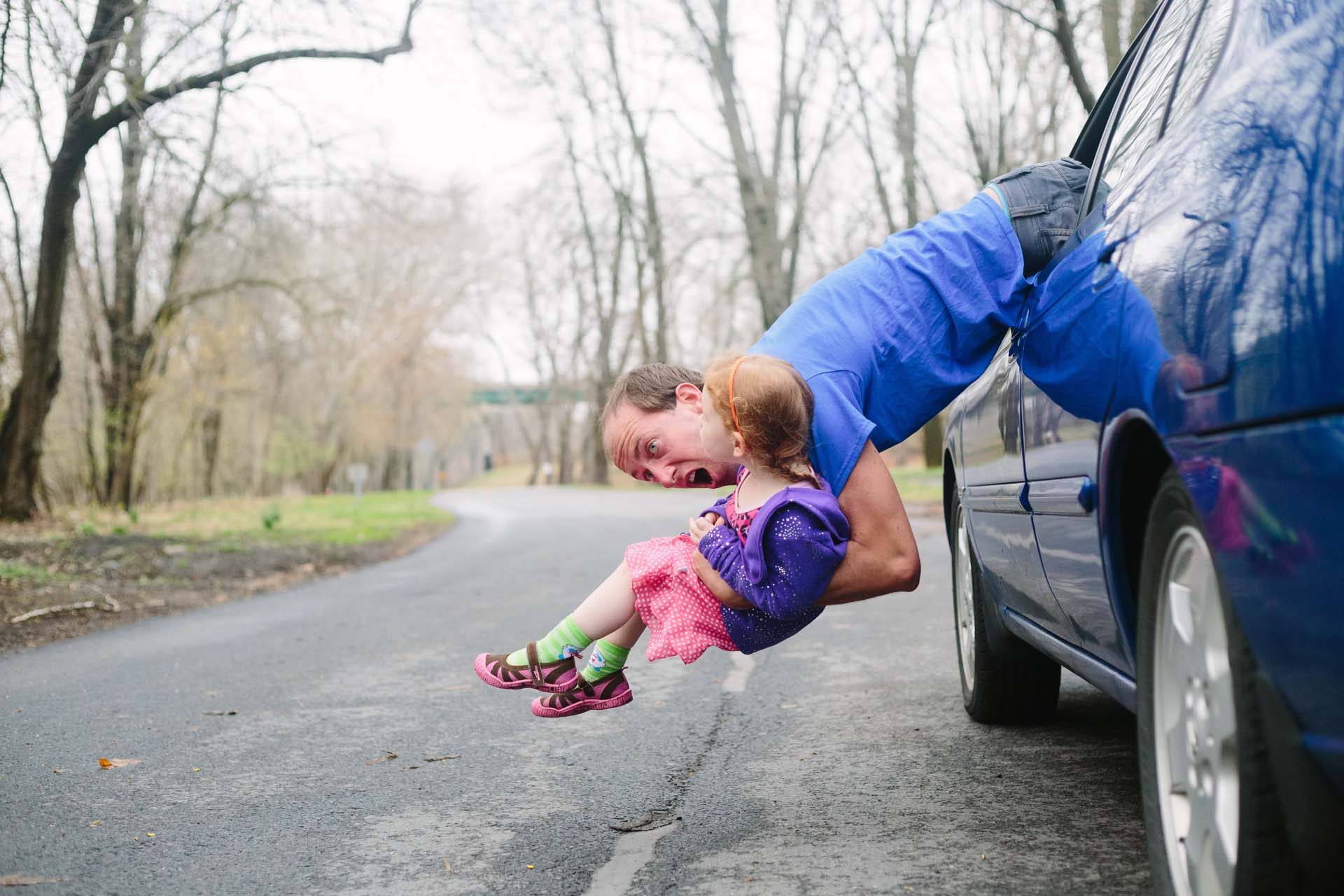 Blue Holding Baby